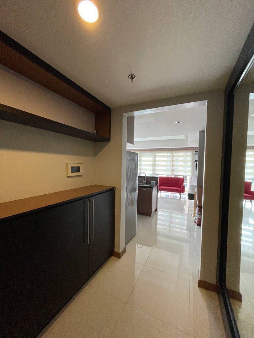 McKinley Hill 1BR condo with parking (Category: Apartments & Condos) located in Makati City. Submitted by best.seconds (Listing ID 1369372185, Image 2). Description: FOR SALE: Classification: Residential Description: 1 Bedroom Unit (renovated) Location: Bellini Tower, BGC Floor area: 68sqm Orientation/view: corner unit, faces southwest (McKinley Road itself) Price (gross/net): 12.5 mn net. Other inclusions: 1 parking slot in front of elevator, se