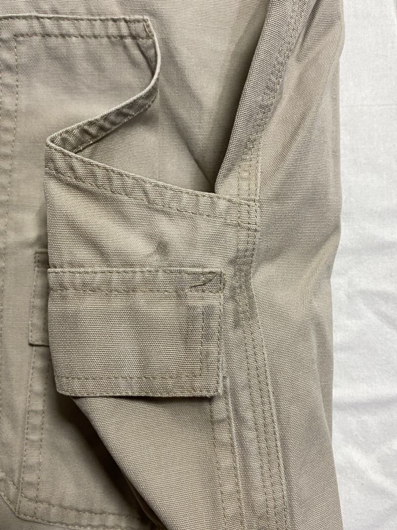 Multi-pocket Fishing Vest (Category: Vests) located in Cabuyao City. Submitted by dead_mans_clothes (Listing ID 1369434643, Image 2). Description: 24.5x25.5 - L Flaw/s: Yellow stains (washable) and Black stain(unnoticeable).
