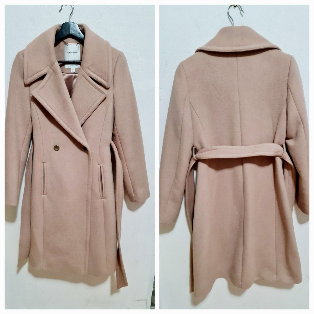 Near New Forever New Florence Wool Blend Coat(Size 8) (Category: Women's Clothes) located in Sydney. Submitted by desirably (Listing ID 1369433666, Image 2). Description: Near New Forever New Florence Luxury Wool Blend Coat(Size 8) for $110. Colour Blush Pink. Worn only once&in excellent condition. Not quite my size, hence the cheap sale. Super wam and cozy! Length: 100cm (Size AU 8) Tailored fit Double-breasted design Luxurious wool-blend fabric