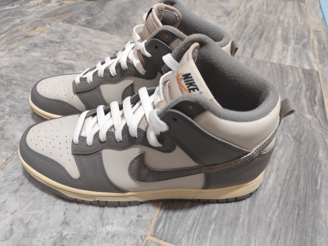 Nike Dunk High Light Bone Tumbled Grey (RUSH) (Category: Sneakers) located in Marikina City. Submitted by xmarcmywordsx (Listing ID 1369361497, Image 1). Description: Nike Dunk High Light Bone Tumbled Grey Size 9.5 Used twice only in the mall RFS: I'm now WFH so I'm selling some of my extra shoes that I hardly use at a very low price. ‼️I can also sell this shoe in bundle. That includes Jordan 6 Washed Denim and New Balance 57/40 Magnet Sea Salt.