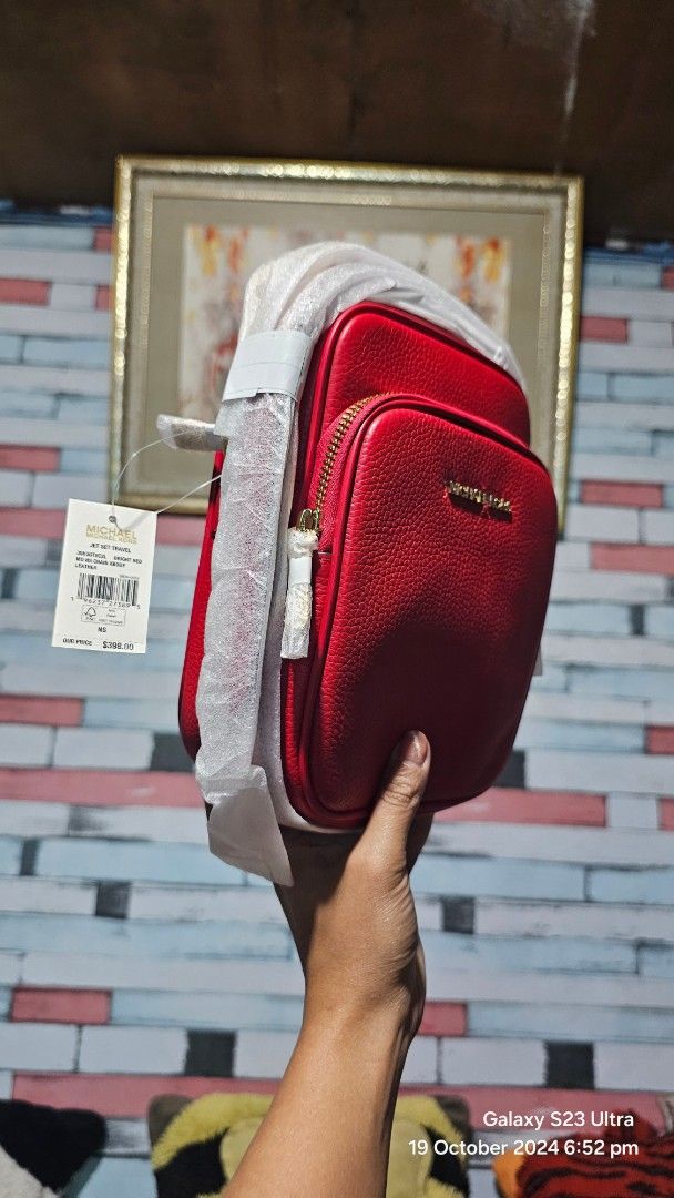 ORIG BRANDNEW MK FLIGHT BAG (Category: Shoulder Bags) located in Baguio. Submitted by msgold2601 (Listing ID 1369489645, Image 3). Description: ORIG MK FLIGHT BAG RED PEBBLED LEATHER.