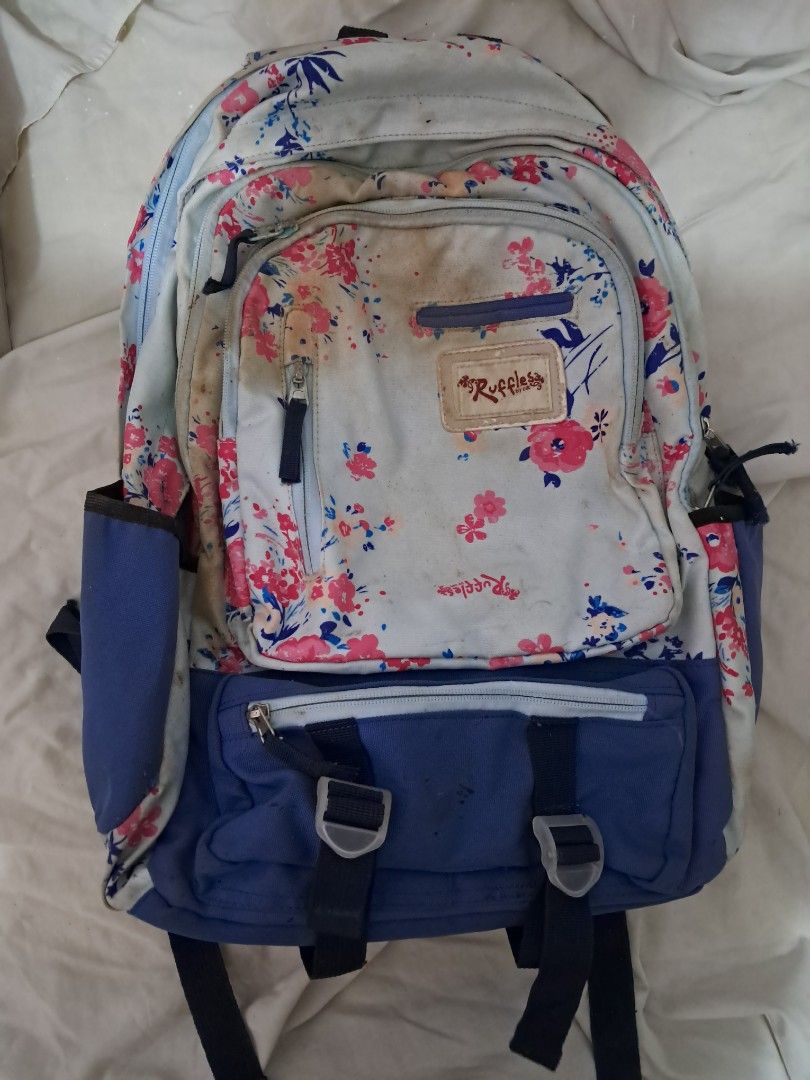 Ruffles backpack school bag (Category: Backpacks) located in Santa Rosa. Submitted by itsnotjgirl (Listing ID 1369477988, Image 1). Description: discolored orig price P2,100 all zippers are working free 2 notebooks for sure buyer shipping available via LBC and lalamove meet up available: sm santa rosa PM for more info.