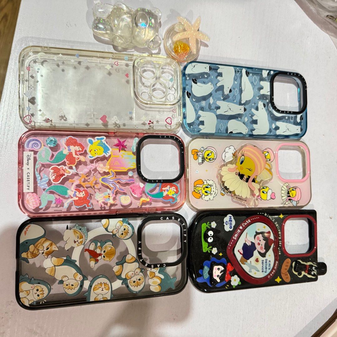 *SALE* IPHONE 15 PRO cases + 2 pop sockets (Category: Cases & Sleeves) located in Makati City. Submitted by closetsquad (Listing ID 1369448201, Image 2). Description: ☀️ GARAGE SALE; authentic items! ☀️ Condition: 9/10 🌸 RFS: Decluttering 🌸 Discounts if buying 2 or more items ⬇️⬇️⬇️ PLS READ ⬇️⬇️⬇️ 🌺 NO returns / NO refunds / NO swaps 💸 MOP: BPI / GCASH only 🚚 95 SF MM / 150 GMM & LUZ / 180 VISMIN 🛵 NO picking of courier / orange app 🚗 For
