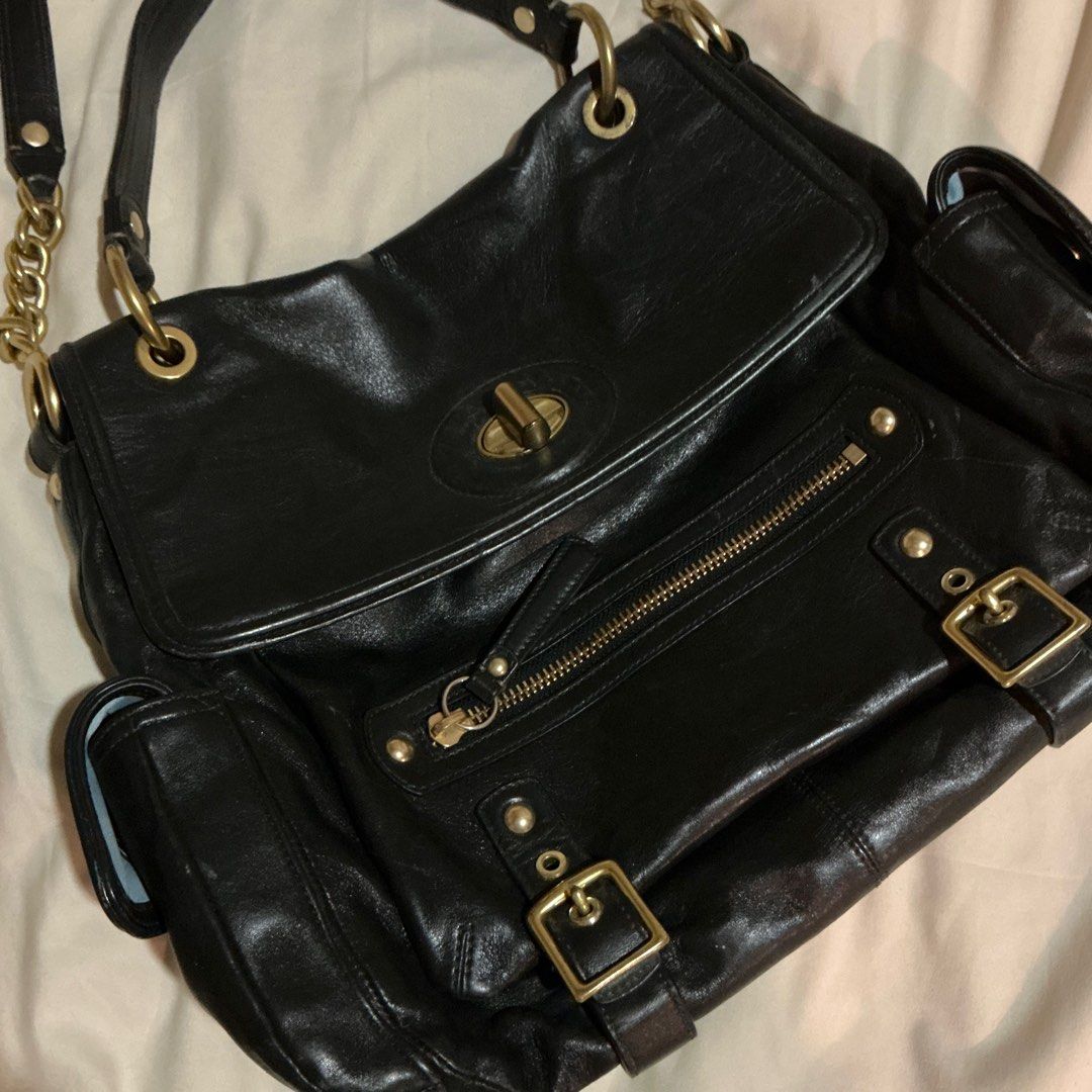 Vintage Y2K Coach Bag (Category: Luxury Bags & Wallets) located in Quezon City. Submitted by pandapattycakes (Listing ID 1369440720, Image 1). Description: Vintage Y2K Coach Sydney Turn-lock Flap Black Leather Bag - Bought by my mom in the early 2000s sa Dubai - Please note na original packaging and everything is gone na :( - But this is guaranteed authentic Feel free to message me for more details/photos or if you have questions..