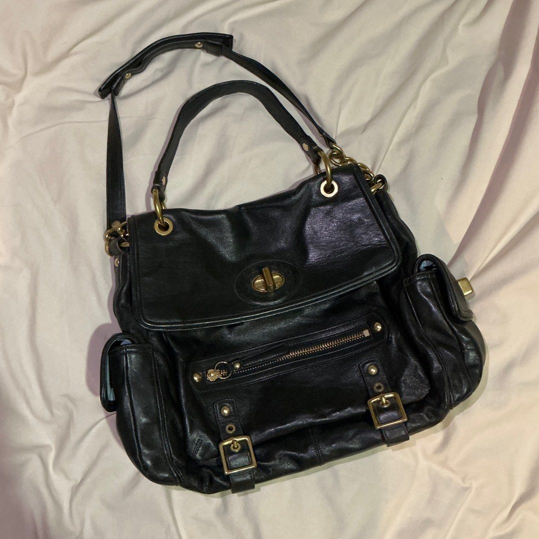 Vintage Y2K Coach Bag (Category: Luxury Bags & Wallets) located in Quezon City. Submitted by pandapattycakes (Listing ID 1369440720, Image 2). Description: Vintage Y2K Coach Sydney Turn-lock Flap Black Leather Bag - Bought by my mom in the early 2000s sa Dubai - Please note na original packaging and everything is gone na :( - But this is guaranteed authentic Feel free to message me for more details/photos or if you have questions..
