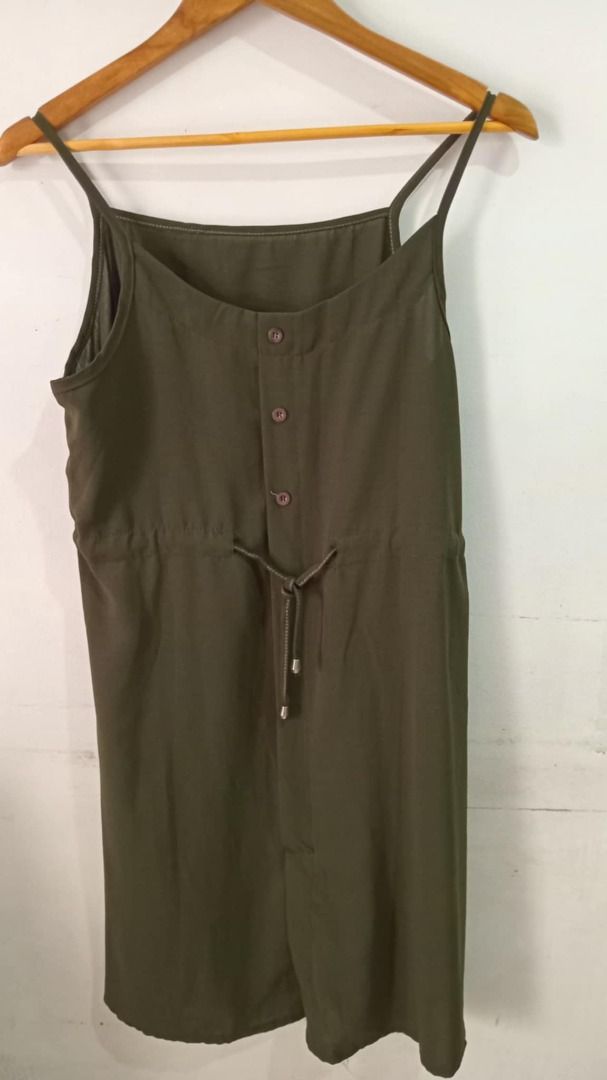 ZARA-inspired Olive Green Dress (Category: Dresses) located in Quezon City. Submitted by Alvinne (Listing ID 1369417587, Image 1). Description: Size - fits medium to Large Adjustable on waist Keep it cool and effortless in this olive green sleeveless jumpsuit dress. Designed with a flattering drawstring waist, button-front detail, and lightweight fabric, it’s perfect for warm days and easy layering. Just add sandals and you're good to go!.