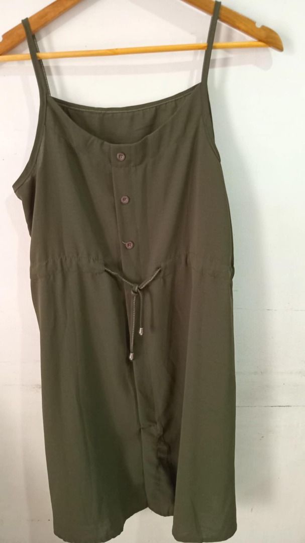 ZARA-inspired Olive Green Dress (Category: Dresses) located in Quezon City. Submitted by Alvinne (Listing ID 1369417587, Image 2). Description: Size - fits medium to Large Adjustable on waist Keep it cool and effortless in this olive green sleeveless jumpsuit dress. Designed with a flattering drawstring waist, button-front detail, and lightweight fabric, it’s perfect for warm days and easy layering. Just add sandals and you're good to go!.