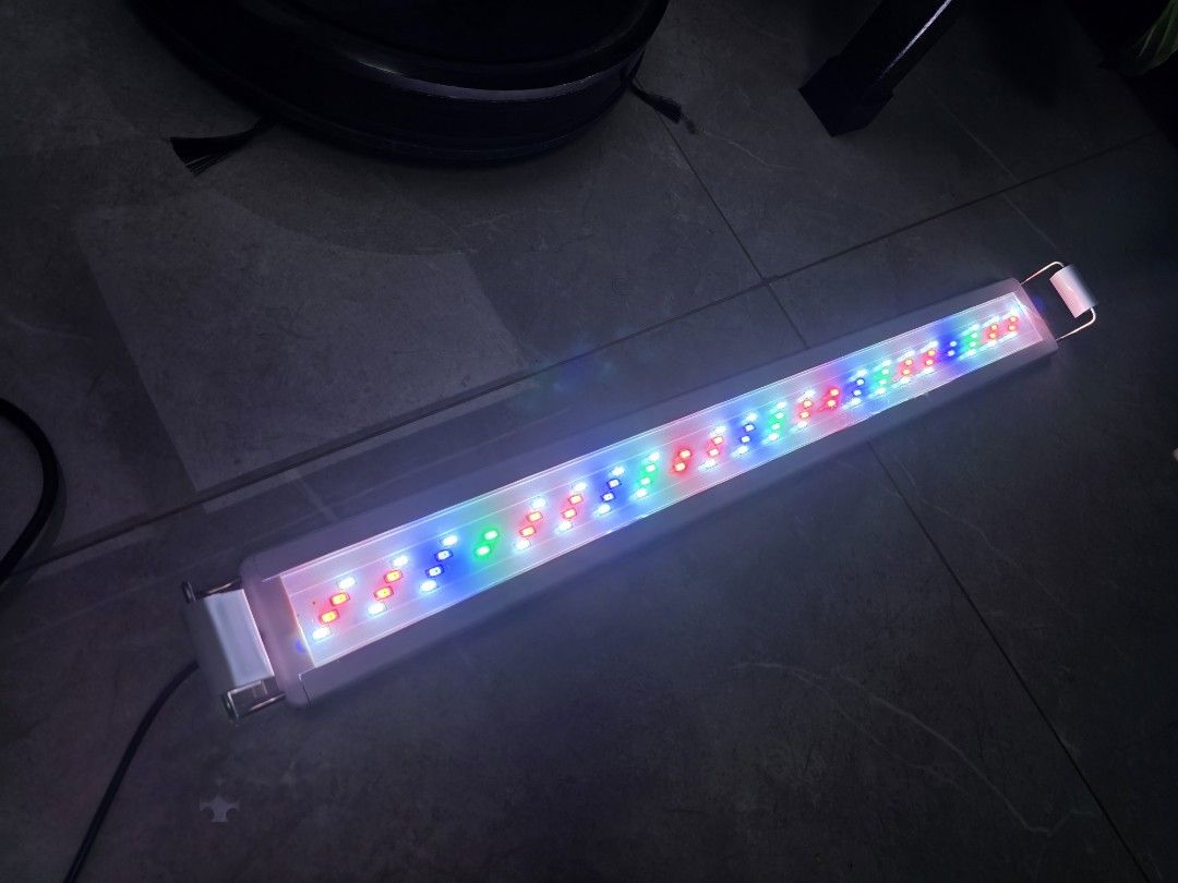 2ft led light (Category: Homes & Other Pet Accessories) located in Singapore. Submitted by azone9999 (Listing ID 1369607828, Image 2). Description: bought but didn't use plastic sheet on light still intact 3 modes 2ft light $25 brand new.