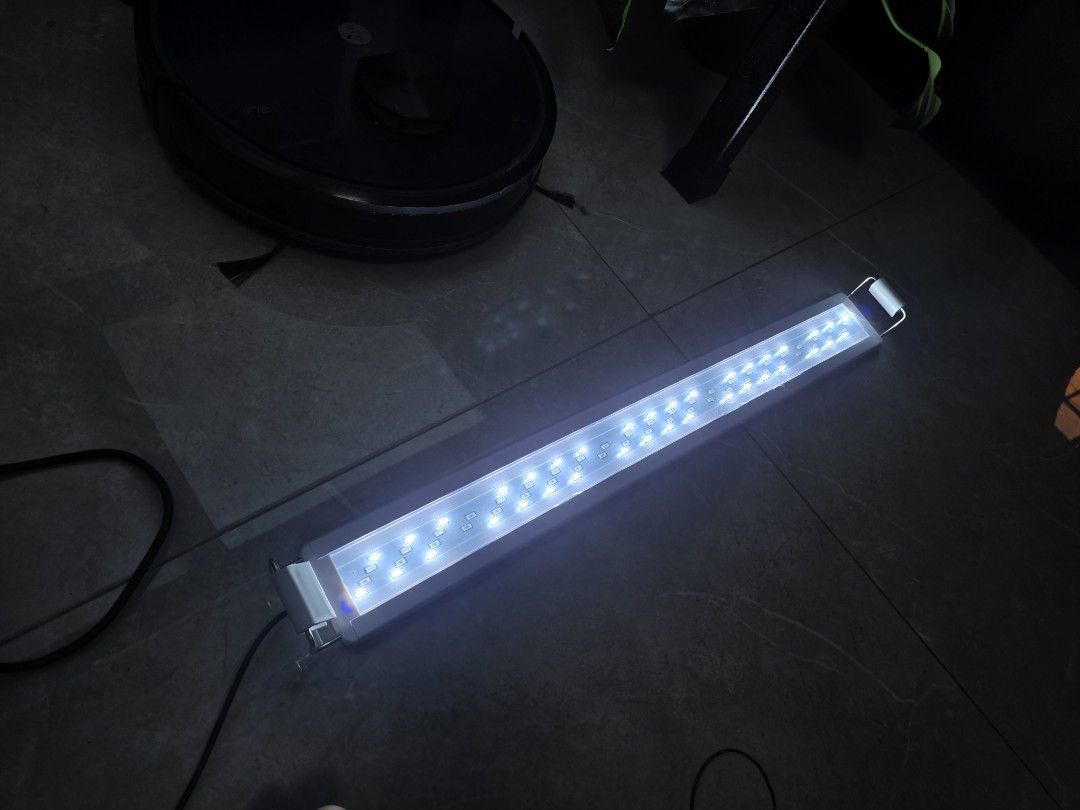2ft led light (Category: Homes & Other Pet Accessories) located in Singapore. Submitted by azone9999 (Listing ID 1369607828, Image 3). Description: bought but didn't use plastic sheet on light still intact 3 modes 2ft light $25 brand new.