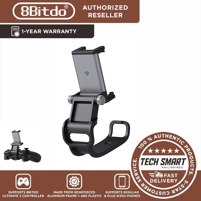 8BitDo Mobile Clip for 8BitDo Ultimate 2 Controller, Adjustable Phone Mount (Category: Controllers) located in Las Pinas. Submitted by techsmartph (Listing ID 1369629292, Image 1). Description: * Designed specifically for 8BitDo Ultimate 2 Controller. * Expandable Clip to fit large smartphones - Min: 49mm, Max 85mm. * Adjustable Angle: Secure grip with customizable positioning for comfortable gaming. * Reinforced aluminum frame + ABS plastic for 