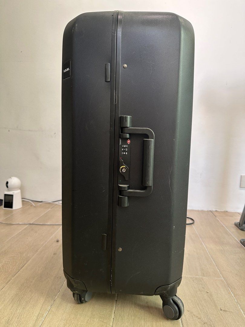 Lojel hardcase clamshell TSA luggage medium (Category: Luggage) located in Pasig City. Submitted by minimaliving (Listing ID 1369504326, Image 3). Description: Very sturdy, light. Secure lock. With very nice organized interior. TSA lock. Used twice only. Last price posted. :).