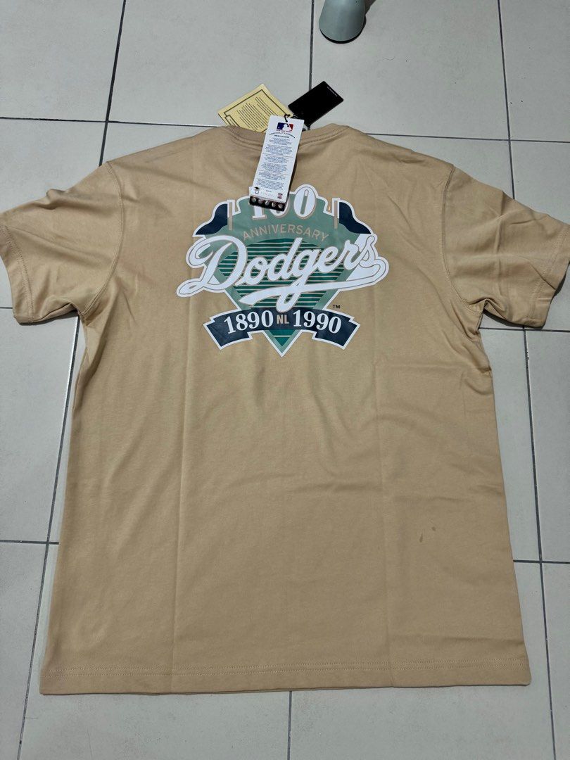 New era tee (Category: Tshirts & Polo Shirts) located in Singapore. Submitted by tamagotchi (Listing ID 1369628362, Image 2). Description: Both is L size for around 170-175cm. Item for $45 each Both for 80$ Ref link For blue color https://neweracap.com.sg/products/ss-tee-5950-pack-planetary-houastco-grph For brown color https://neweracap.com.sg/products/59fifty-pack-seaglass-los-angeles-dodgers-cooperstown-oat-milk-short-sleeve-t-shirt.