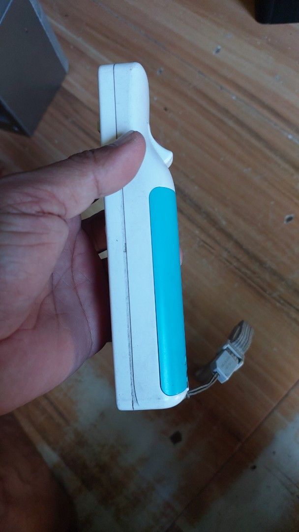 Nintendo Wii mote Tested working (Category: Controllers) located in Quezon City. Submitted by jpnvintageonline (Listing ID 1369499849, Image 3). Description: Nintendo Wii mote Tested working battery cover blue color.