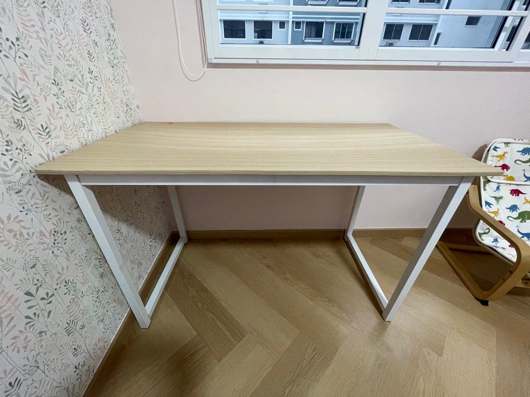 Study Table (Category: Tables & Sets) located in Singapore. Submitted by nararozz (Listing ID 1369510917, Image 2). Description: Dent in the middle of table Measurement: Width- 60cm Length- 120cm Height- 74cm.