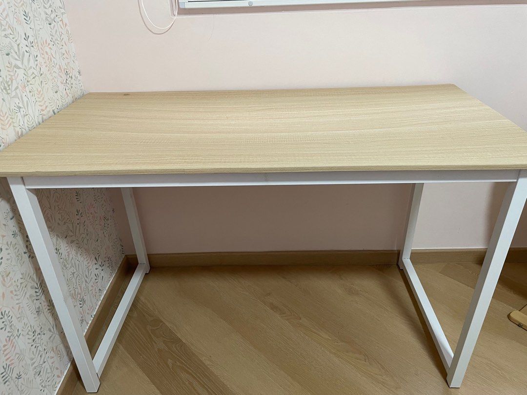 Study Table (Category: Tables & Sets) located in Singapore. Submitted by nararozz (Listing ID 1369510917, Image 3). Description: Dent in the middle of table Measurement: Width- 60cm Length- 120cm Height- 74cm.