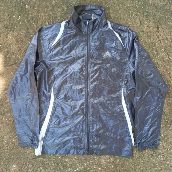 VINTAGE ADIDAS SWEAT SUIT JACKET (Category: Activewear) located in Manila. Submitted by seanandrei53476 (Listing ID 1369547174, Image 1). Description: Adidas Running Jacket 200 PLUS SF Dimes: W21.5, L27.5 Size: Large Condition: Good with signs of usage.