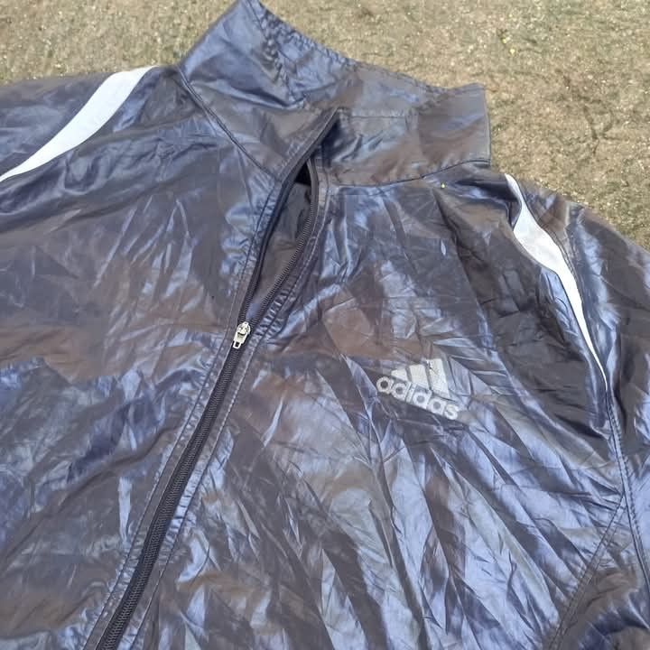 VINTAGE ADIDAS SWEAT SUIT JACKET (Category: Activewear) located in Manila. Submitted by seanandrei53476 (Listing ID 1369547174, Image 3). Description: Adidas Running Jacket 200 PLUS SF Dimes: W21.5, L27.5 Size: Large Condition: Good with signs of usage.