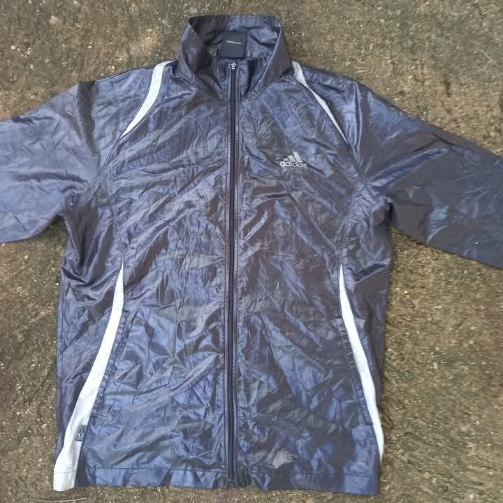 VINTAGE ADIDAS SWEAT SUIT JACKET (Category: Activewear) located in Manila. Submitted by seanandrei53476 (Listing ID 1369547174, Image 2). Description: Adidas Running Jacket 200 PLUS SF Dimes: W21.5, L27.5 Size: Large Condition: Good with signs of usage.