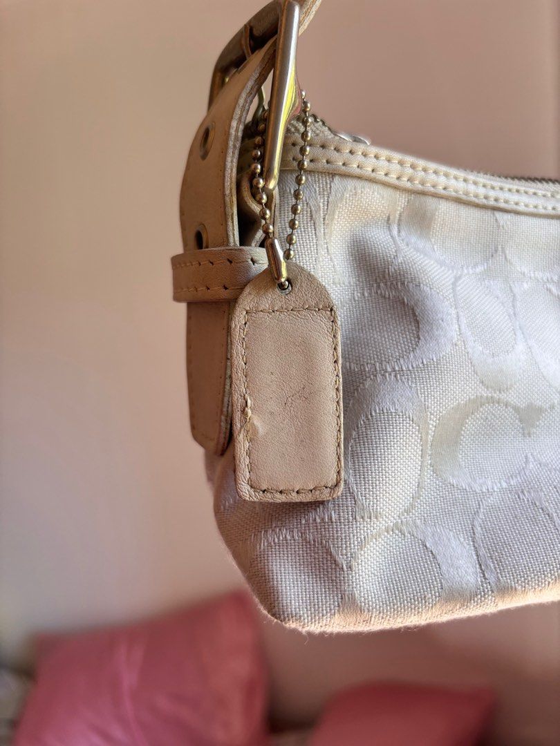 white coach baguette bag (Category: Shoulder Bags) located in Paranaque City. Submitted by lovedbydevi (Listing ID 1369501170, Image 3). Description: slightly nego see minor flaws in last slide.