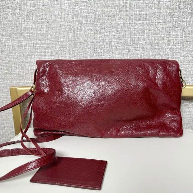 Balenciaga Envelope Clutch (Category: Luxury Bags & Wallets) located in Makati City. Submitted by the_ambitious_peasant (Listing ID 1369800827, Image 3). Description: Balenciaga Envelope Clutch with strap Comes with dust bag, mirror and care cards Folded Size 31cm wide x 18cm high x 3cm deep Detachable strap has an adjustable drop from 52cm to 56cm Weight is 492g #balenciagaph.