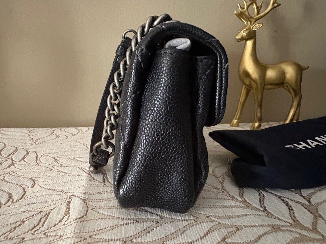 Chanel Rectangular Mini WOC (Category: Bags & Wallets) located in Petaling Jaya. Submitted by passion4bagz (Listing ID 1369763137, Image 3). Description: Price is fixed. No COD Card, Serial Number, Dustbag. No box WOC with rhodium strap. Very useful - can put iphone, key and cards. 3 slots (inner slot has zipper).