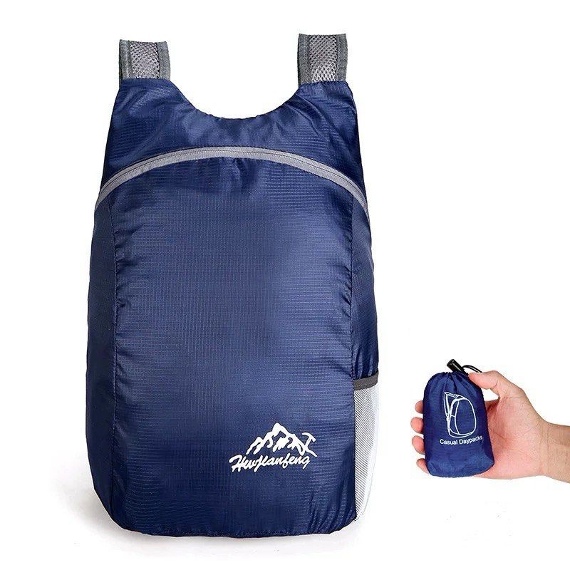 Foldable Backpack (Category: Backpacks) located in Singapore. Submitted by precious.stones (Listing ID 1369802283, Image 1). Description: Product: Foldable Backpack Color: dark blue Note: photos showing light blue are for illustration purpose only, actual selling one is dark blue in first photo.