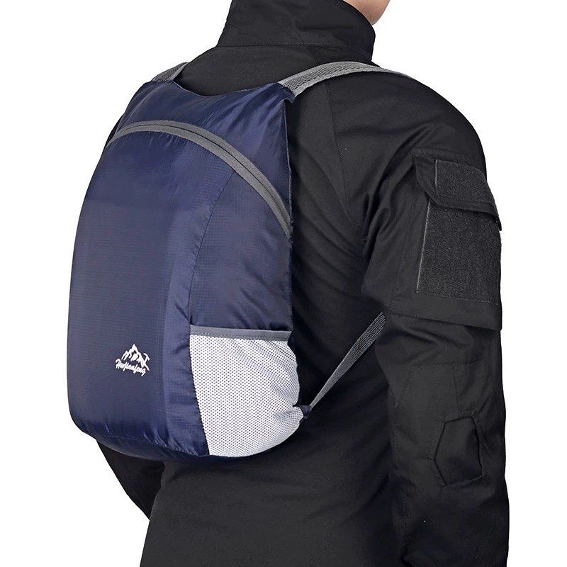 Foldable Backpack (Category: Backpacks) located in Singapore. Submitted by precious.stones (Listing ID 1369802283, Image 2). Description: Product: Foldable Backpack Color: dark blue Note: photos showing light blue are for illustration purpose only, actual selling one is dark blue in first photo.