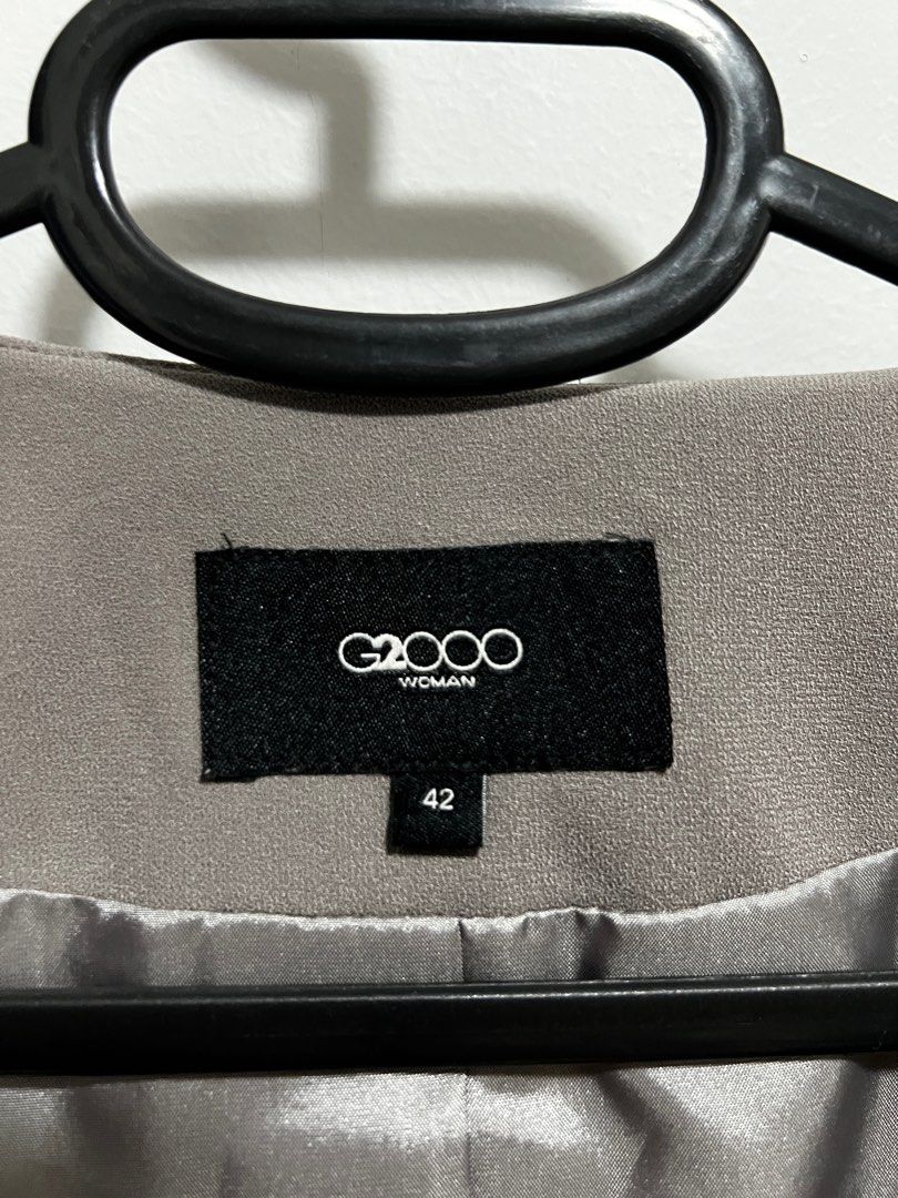 G2000 blazer (Category: Coats, Jackets and Outerwear) located in Singapore. Submitted by lc058 (Listing ID 1369856483, Image 2). Description: Grey G2000 blazer, size 42. No button, instead is hook clasp .