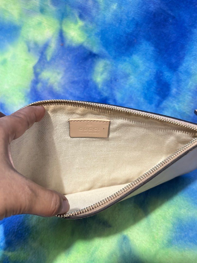 Gucci Pouch wrislet (Category: Luxury Bags & Wallets) located in General Santos City (Dadiangas). Submitted by toysville888 (Listing ID 1369748064, Image 3). Description: Gucci pouch wrislet. minor flaw as seen on pic. no rips no holes but wth minor stain. ‼️✅ PLEASE READ FIRST ✅ i do combine shipment to save on shipping cost.. 🕹️ 90 lng po sf from here sa mindanao, (kung may ISSUE kayo sa shipping fee,hanap po ibang seller 🕹️ i do COMBINE SHIP