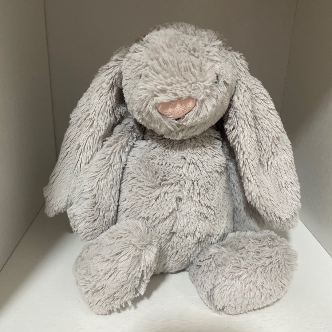 Jellycat Bashful Bunny in Medium Grey Plush Stuffed Toy (Category: Plushies & Soft Toys) located in Pasig City. Submitted by happyen (Listing ID 1369872085, Image 1). Description: Size: Medium Color: Grey Fur is still soft 💗.