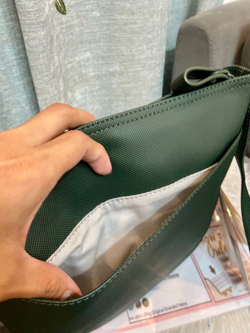 Lacoste sling bag (Category: Cross-body Bags) located in Gapan. Submitted by fernandez22 (Listing ID 1369735821, Image 3). Description: Brandnew lacoste Sling bag With tagprice Original or money back .