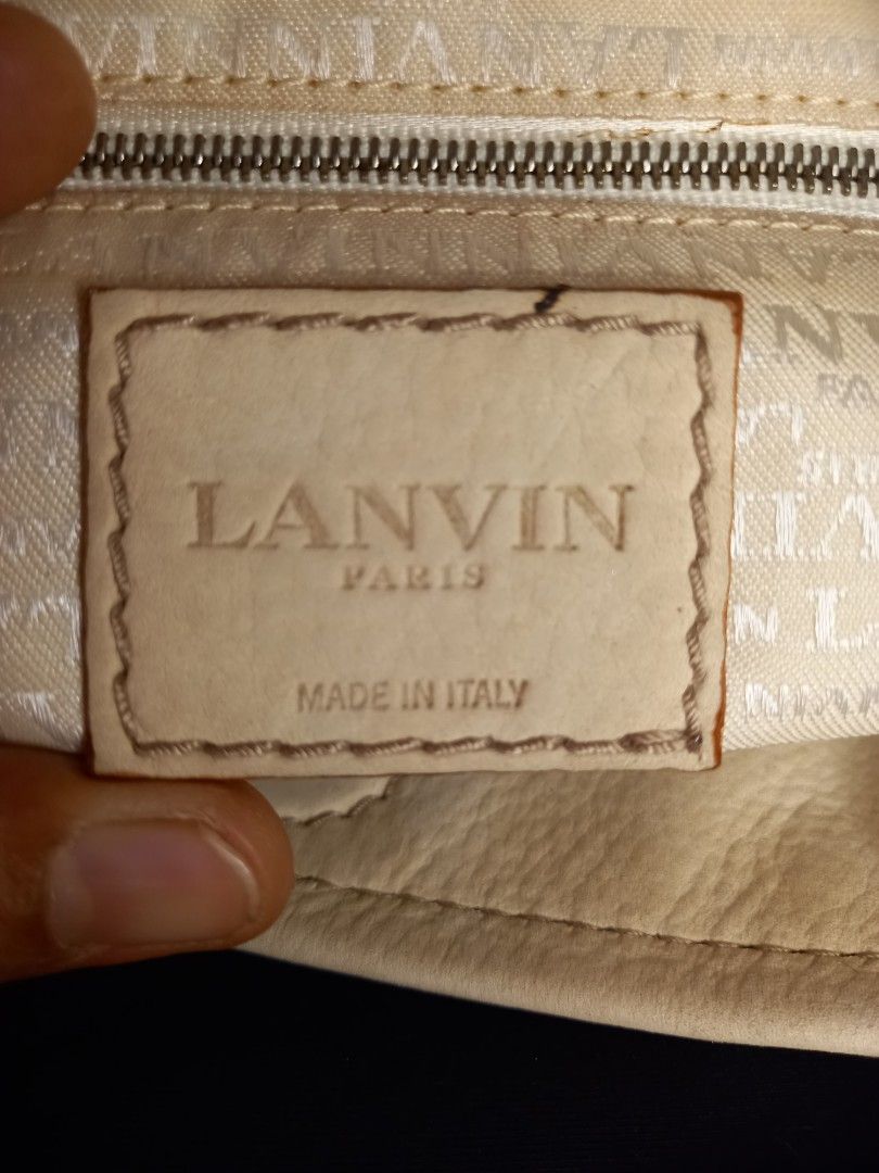 Lanvin 2-way (Category: Luxury Bags & Wallets) located in Bacolod City. Submitted by lippi_bhalanx (Listing ID 1369789153, Image 3). Description: genuine leather 15 x 11 inches no rubs no scratches on body RiRi Zipp in very good condition.
