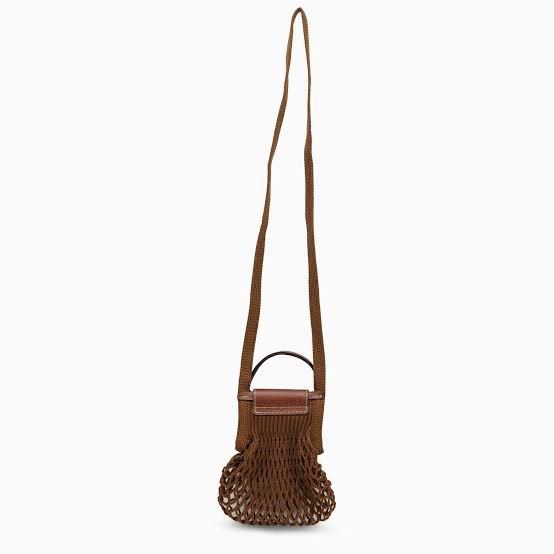 Le Pliage Filet XS Mesh Bag (Brown) (Category: Luxury Bags & Wallets) located in Manila. Submitted by dachshund. (Listing ID 1369759448, Image 2). Description: Original! 9/10 condition. No issue. **LAST PRICE POSTED** Original Price: 6,650 pesos (saves you 2,650 pesos) RFS: Decluttering .