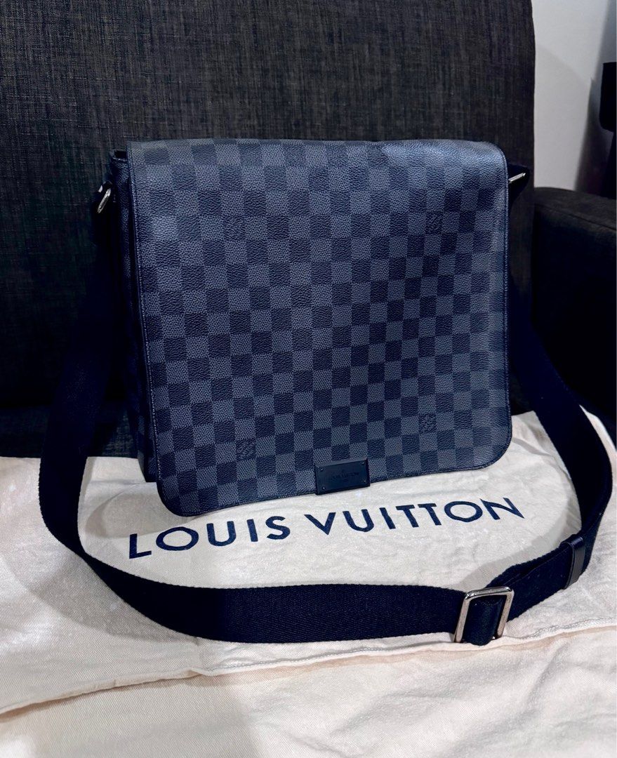 LV Graphite Messenger Bag (Category: Luxury Bags & Wallets) located in Quezon City. Submitted by christineboller (Listing ID 1369873592, Image 2). Description: LV Graphite Daniel Messenger Bag in 9.5/10 condition. Magnetic flap closure, silver hardware. CA4193 (Year 2013). No rubs/scratches on edges. Clean interior. With LV dustbag for only P52k.