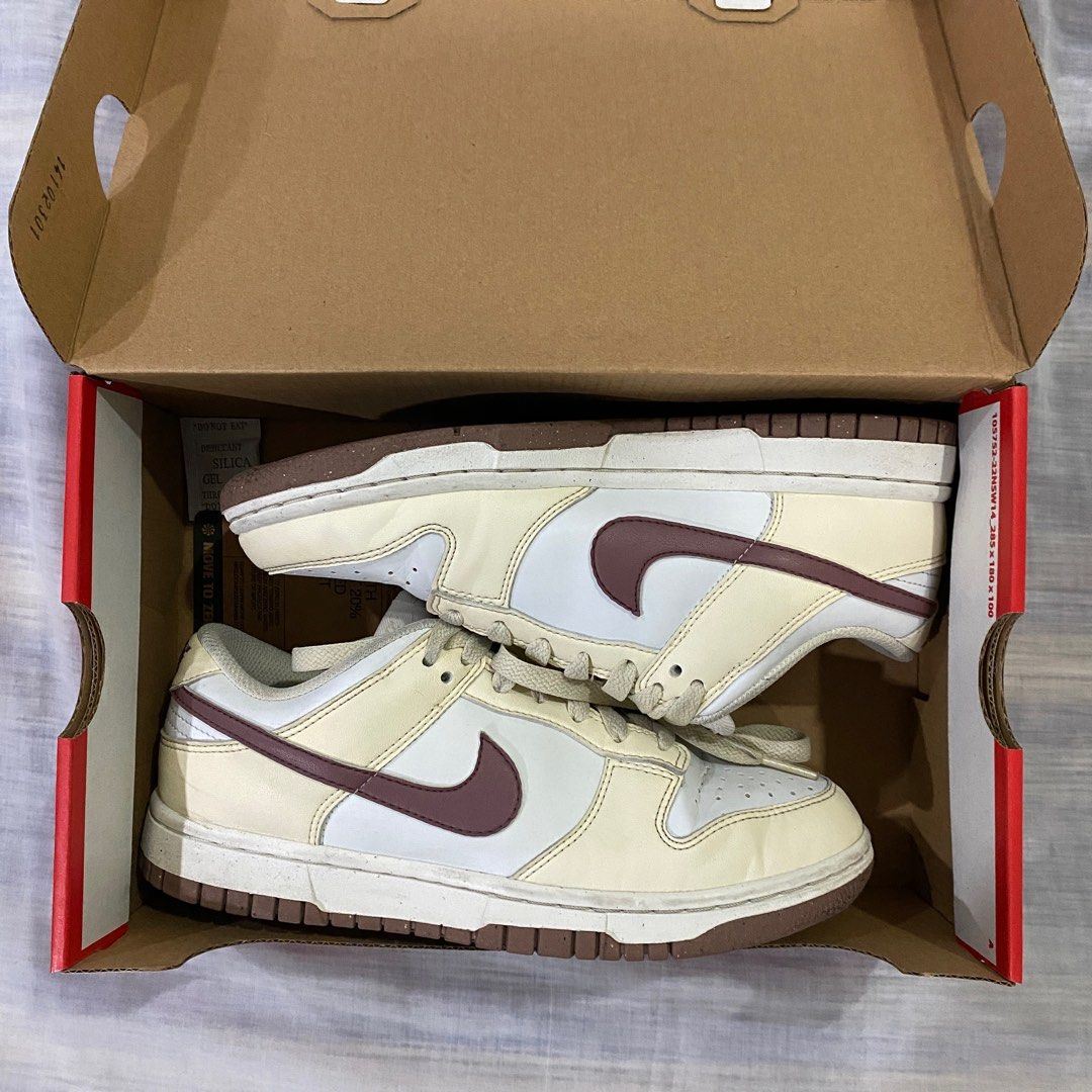 Nike Dunk Low Next Nature Sneakers (Category: Sneakers) located in Antipolo. Submitted by de.klutter (Listing ID 1369764619, Image 2). Description: Nike Dunk Low Next Nature Sneakers - Color: Coconut Milk / Smokey Mauve - Size: Women’s US 6.5 / UK 4 or Men’s US 5 / UK 4 - Comes in its original box with paper tag CONDITION: 8/10. Pre-loved, used with care; just needs cleaning. Guaranteed authentic. Bought this last year, in-store, from Footlocker 