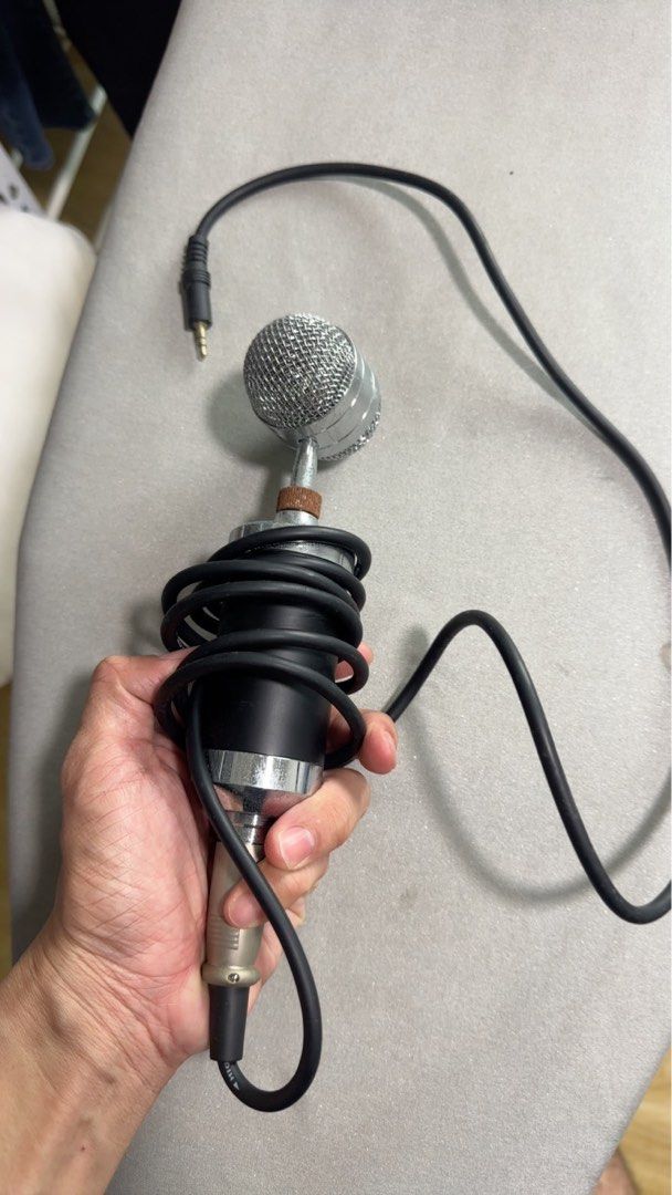 Portable Microphone with Cable (Category: Microphones) located in Singapore. Submitted by specificism (Listing ID 1369725712, Image 3). Description: Free - This is a portable microphone with a cable. It's in good condition and works perfectly. It's perfect for recording vocals, podcasts, or even just for having fun with friends. The cable is long enough to give you plenty of room to move around. It's a great value for the price..