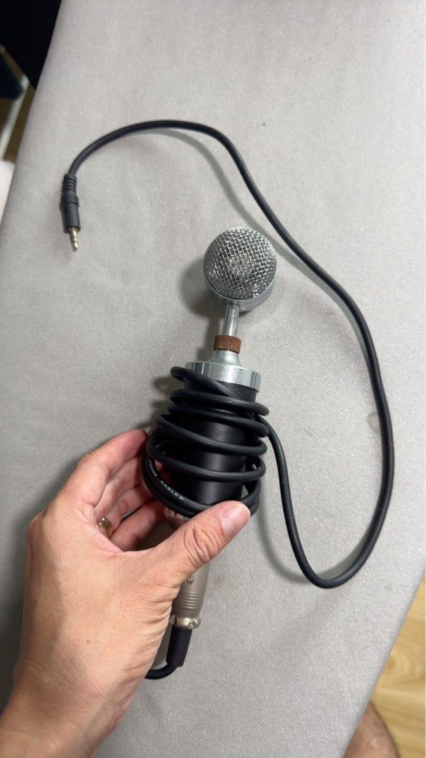 Portable Microphone with Cable (Category: Microphones) located in Singapore. Submitted by specificism (Listing ID 1369725712, Image 2). Description: Free - This is a portable microphone with a cable. It's in good condition and works perfectly. It's perfect for recording vocals, podcasts, or even just for having fun with friends. The cable is long enough to give you plenty of room to move around. It's a great value for the price..