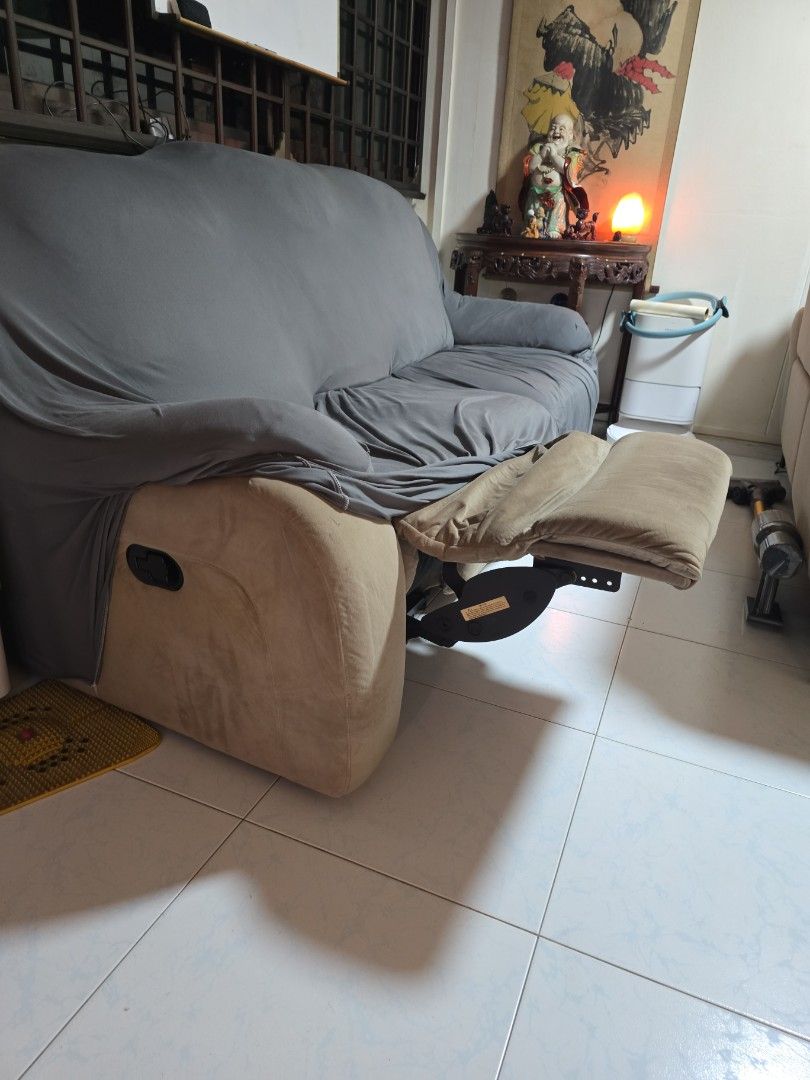 Sofa (Category: Sofas) located in Singapore. Submitted by pet_avalon (Listing ID 1369817624, Image 3). Description: Selling 3 seater sofa - good condition - No tear - Always using it with the cover - Left and right side can lift up the leg rest with the pull of the mechanism, no electricity required Self collect at 931 Hougang Street 91 (sofa is very heavy as it has a metal frame, and cannot fit inside the lift. 4-6 people is recommended to carry
