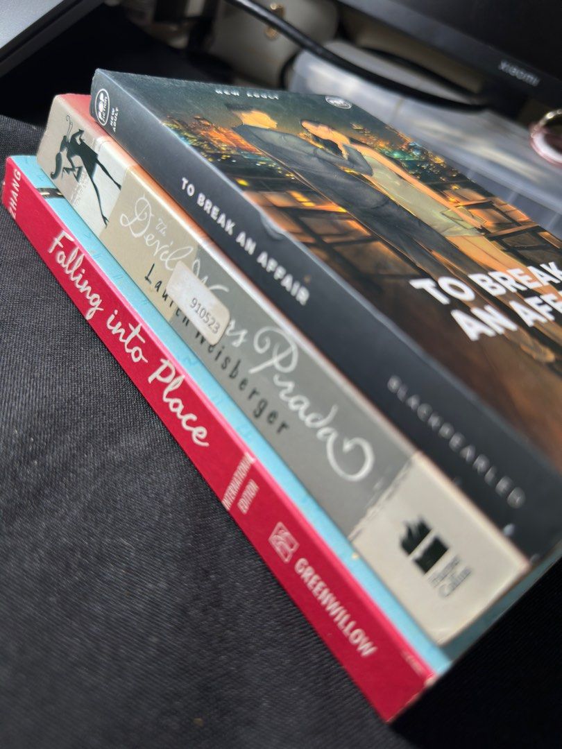 The Devil Wears Prada, Falling into Place, To Break An Affair (Category: Storybooks) located in Manila. Submitted by cmaerb (Listing ID 1369796592, Image 1). Description: selling as bundle to break an affair - brand new the devil wears prada - like new falling into place - like new.