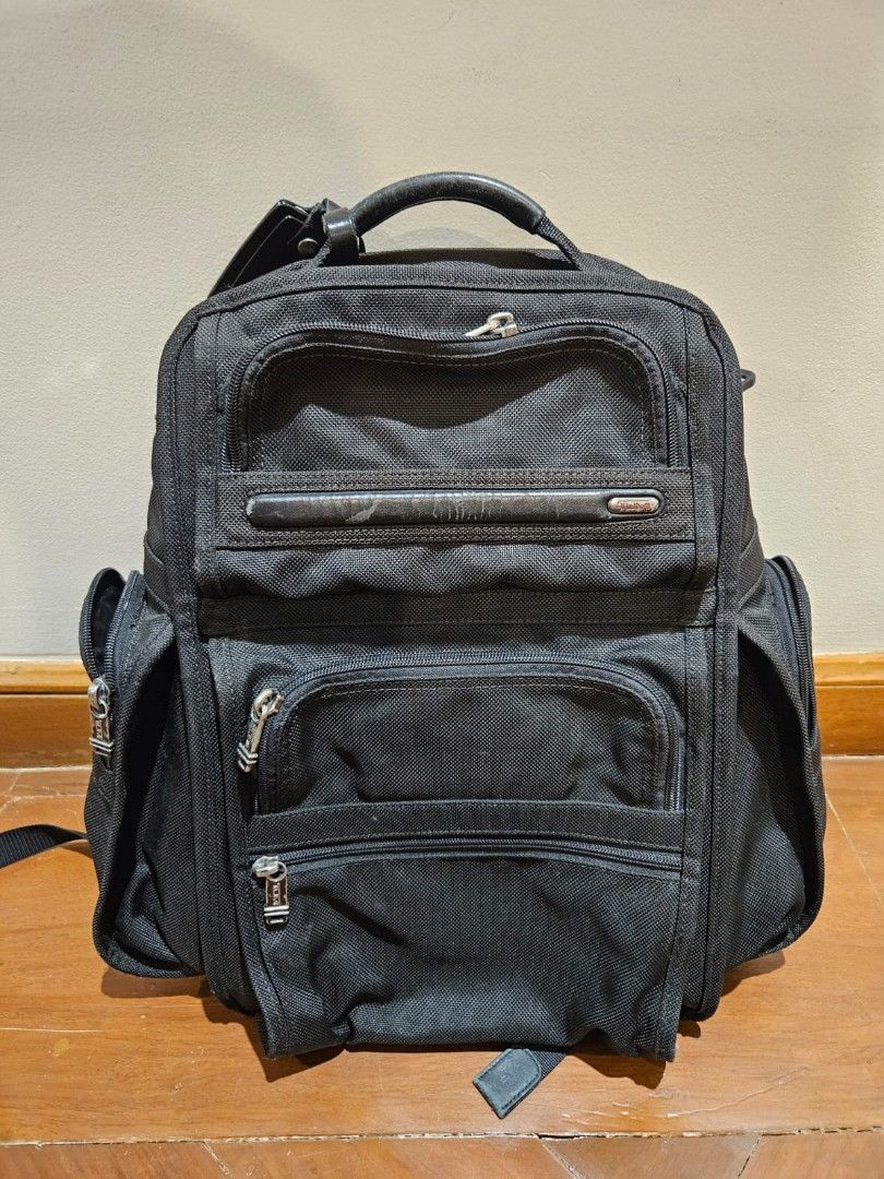 TUMI Backpack Alpha T-Pass Backpack for Laptop (Category: Backpacks) located in Pasig City. Submitted by clothesandthings_ (Listing ID 1369831442, Image 1). Description: Authentic Original retail at 40,000 Fully functional no issues Aesthetic 6/10 slight peeling of leather details, signs of usage ( see photo).