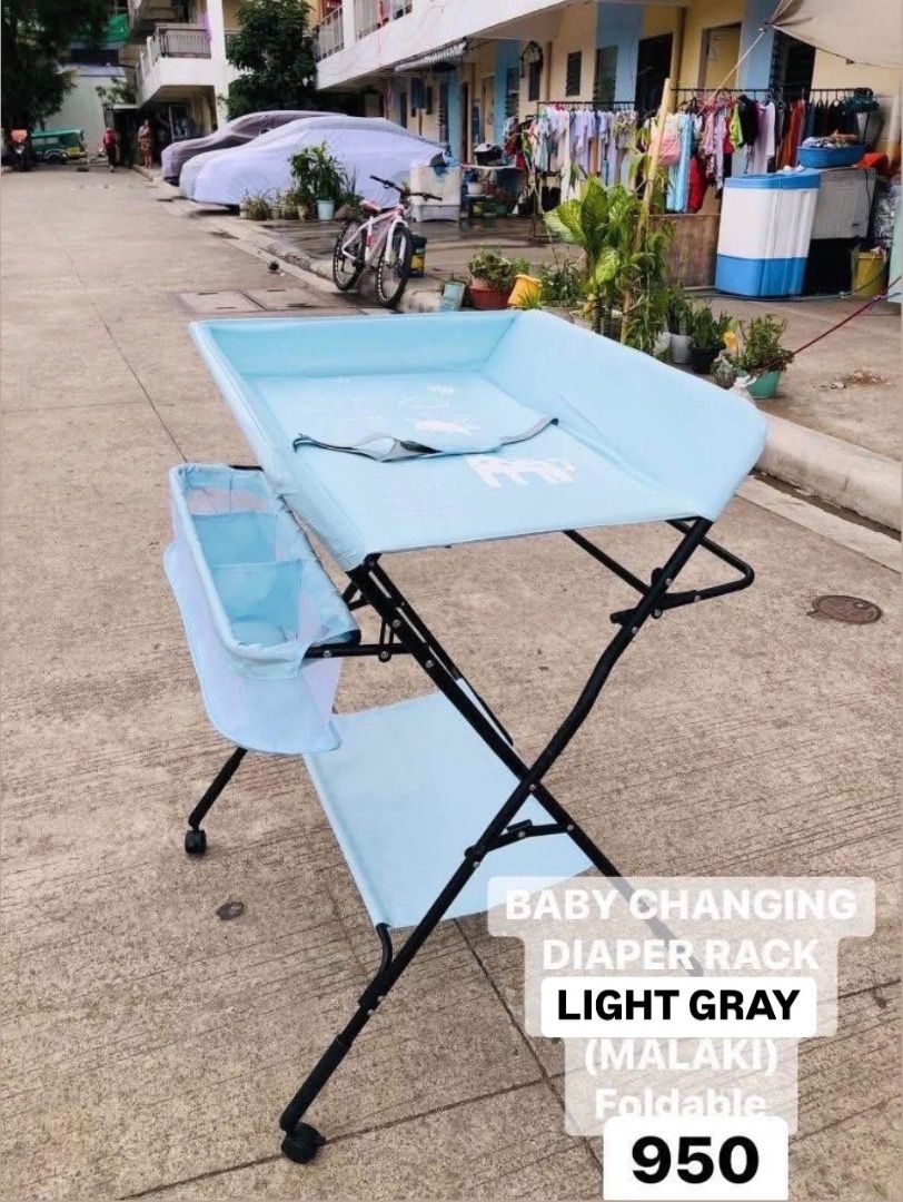2in1 Diaper Changing table and bath (Category: Changing Tables & Stations) located in Quezon City. Submitted by docagillemontemayor (Listing ID 1370059622, Image 1). Description: Used 3x only, pinagpatungan Lang ng baby clothes nya. Baby changing station, can also put Bath tub on top para mas easier mapaliguan si baby. 2in1 na sya. Rfs: Need space sa room ni baby.