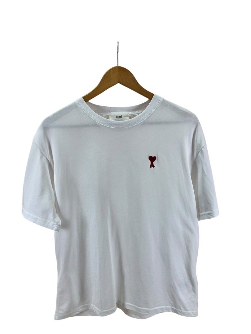 Ami white tee (Category: Luxury Apparel) located in Manila. Submitted by 12essentials (Listing ID 1369917196, Image 1). Description: 📌 Excellent Condition 📌 M on tag 📌 Length 27.5’ Width 21’.
