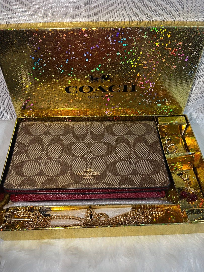 Coach Sling Wallet (Category: Luxury Bags & Wallets) located in Makati City. Submitted by rianmns (Listing ID 1369984632, Image 1). Description: Its almost new, Used twice only. Flaw -encircle (see pic) reason why price mark down.