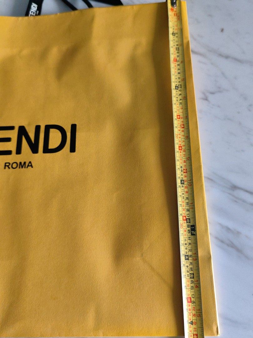 Fendi paperbag (Category: Luxury Bags & Wallets) located in Makati City. Submitted by kruelscloset (Listing ID 1369888506, Image 2). Description: 16x16in Fendi paperbag. Fits bag and shoes.