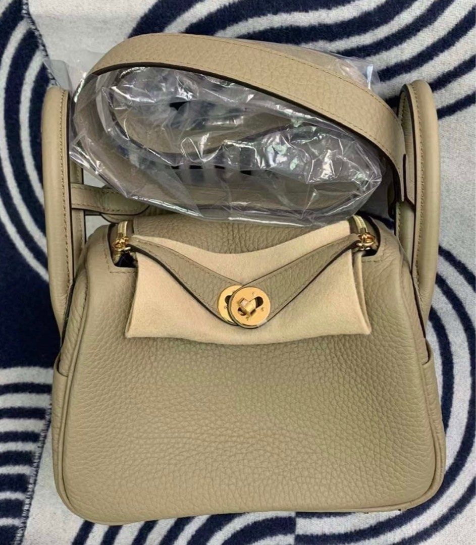 Hermes Mini Lindy Beige Marfa Stamp W (Category: Luxury Bags & Wallets) located in Cainta. Submitted by maribei (Listing ID 1369918947, Image 1). Description: Used Once Film intact on hardware Complete inclusions: box, dustbag, receipt Stamp W RFS: will change color.