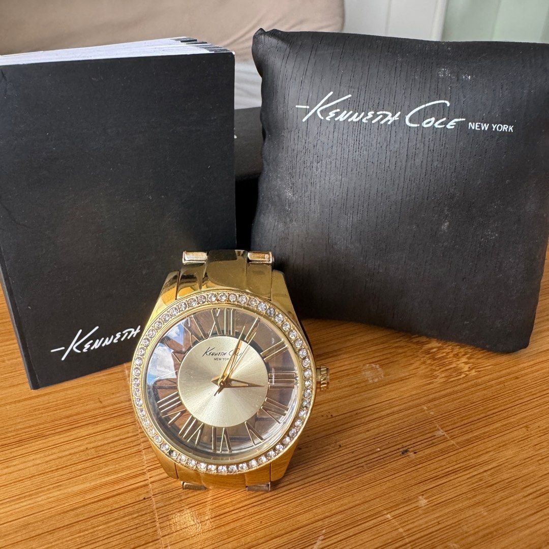 Kenneth Cole New York Watch (Category: Women's Watches) located in Taguig. Submitted by candy.j (Listing ID 1369912531, Image 2). Description: 100% Authentic Kenneth Cole (preloved) Gold Plated Watch with crystals Bought in SM Aura Department Store Inclusion: care card and watch cushion RFS: decluttering too many watches.