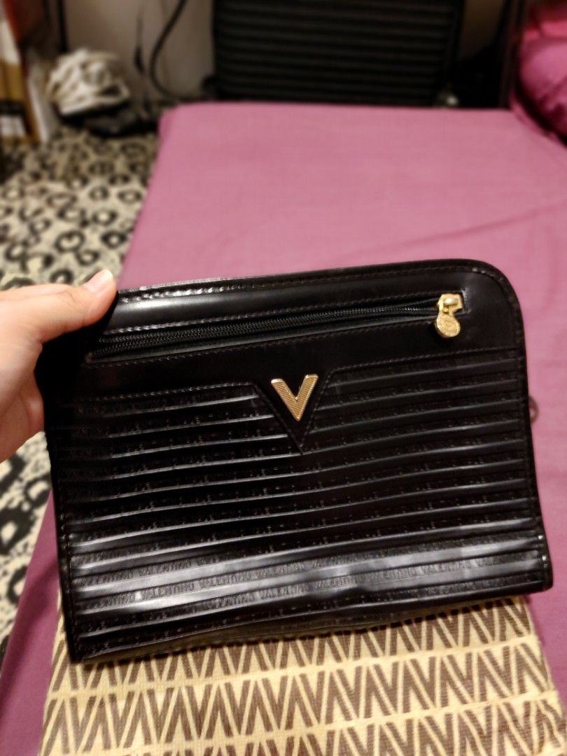 Mario Valentino Clutch Bag (Category: Clutches) located in Valenzuela. Submitted by trislndgn (Listing ID 1369949991, Image 1). Description: Declutter 💕 Like New With Dust Bag Send me your best offer 🥰.