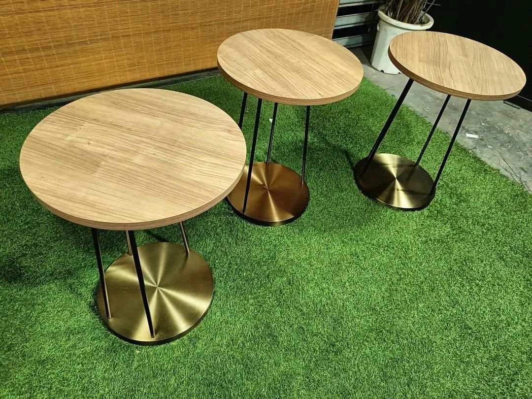 Modern Elegant Round Side (Category: Chairs) located in Quezon City. Submitted by matetdevis13 (Listing ID 1369989930, Image 3). Description: Modern Elegant Round Side / Coffee Table Thick Solid Wood Top, Brass Frame & Base Price : 5000 each; 12,500 for 3 18 inches diameter, 24 inches tall In VERY good condition Code HOMEBOSS.