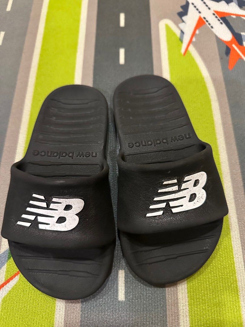 New Balance Slippers for Kids (Category: Babies & Kids Fashion) located in Cainta. Submitted by drips81 (Listing ID 1370023206, Image 1). Description: Size 12.