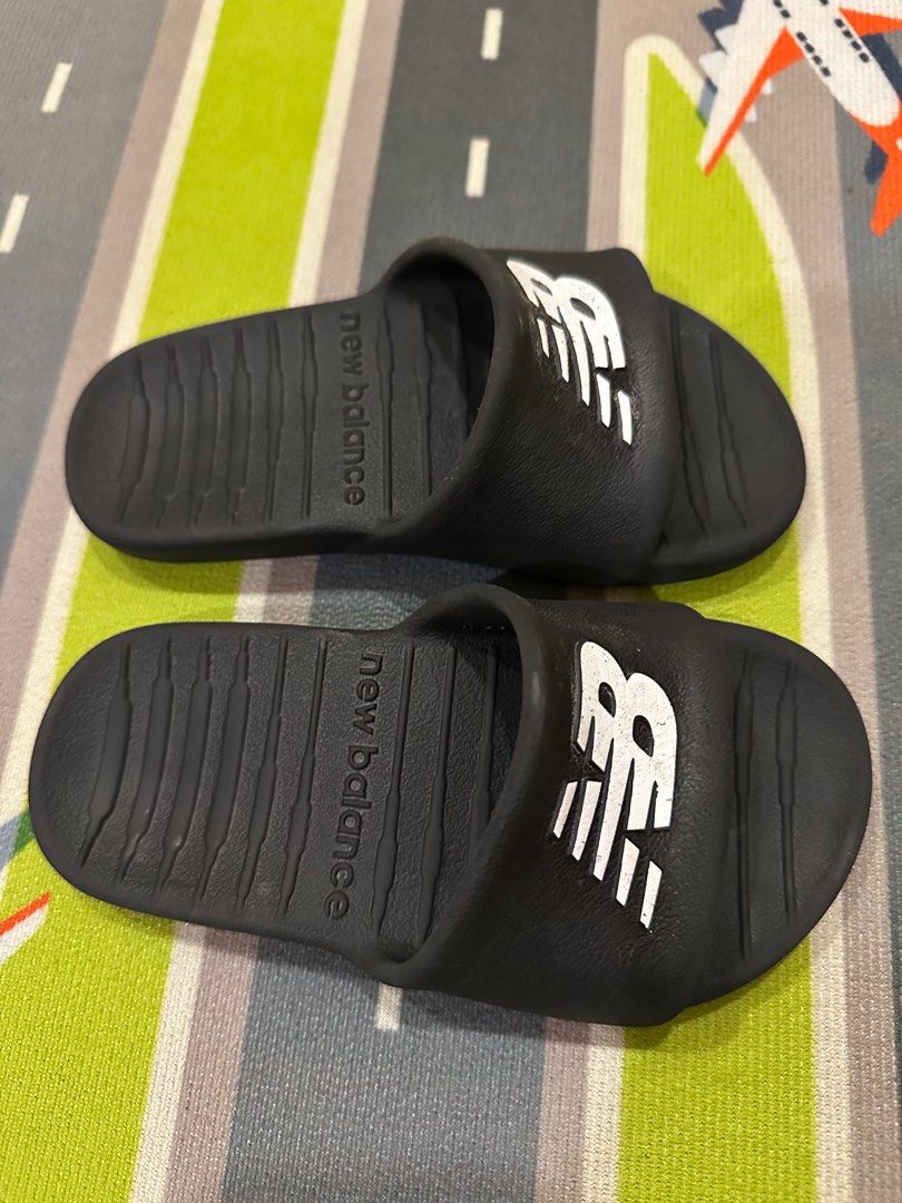 New Balance Slippers for Kids (Category: Babies & Kids Fashion) located in Cainta. Submitted by drips81 (Listing ID 1370023206, Image 2). Description: Size 12.